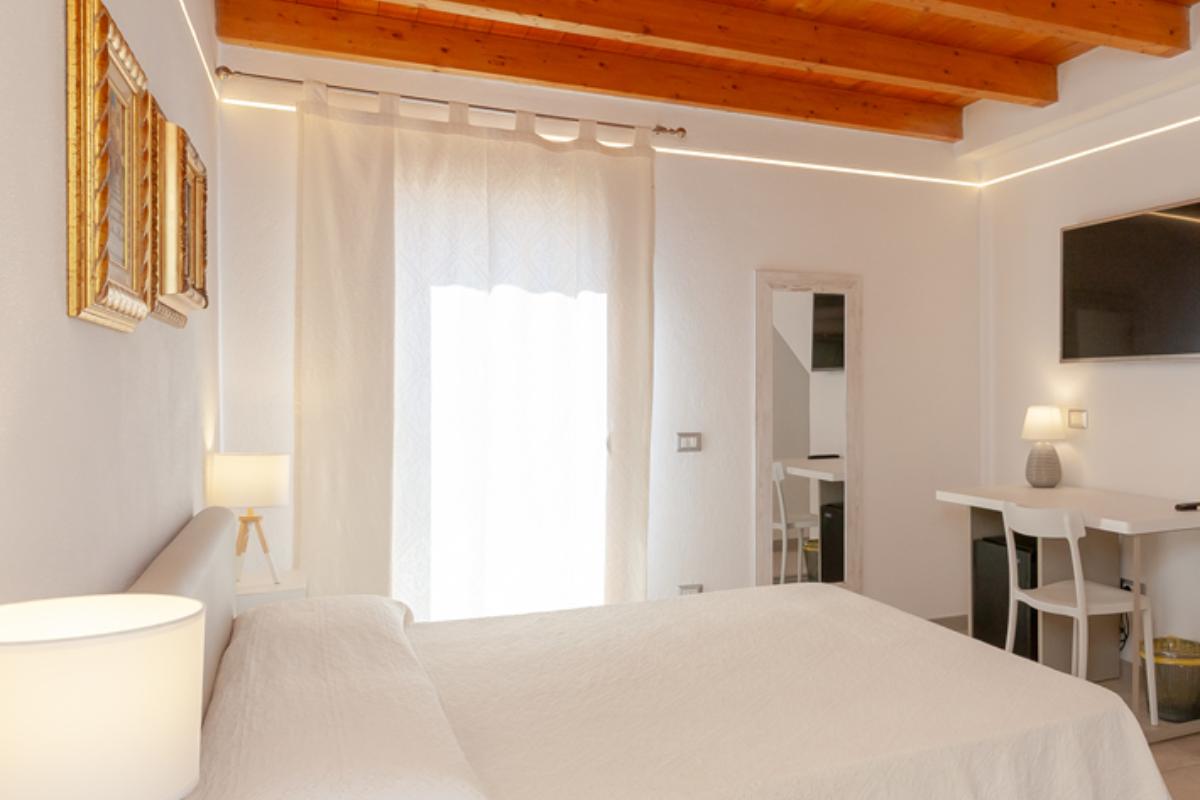 Residenze Pettirosso Pettirosso Center San Teodoro -  Camera Camera Deluxe 1