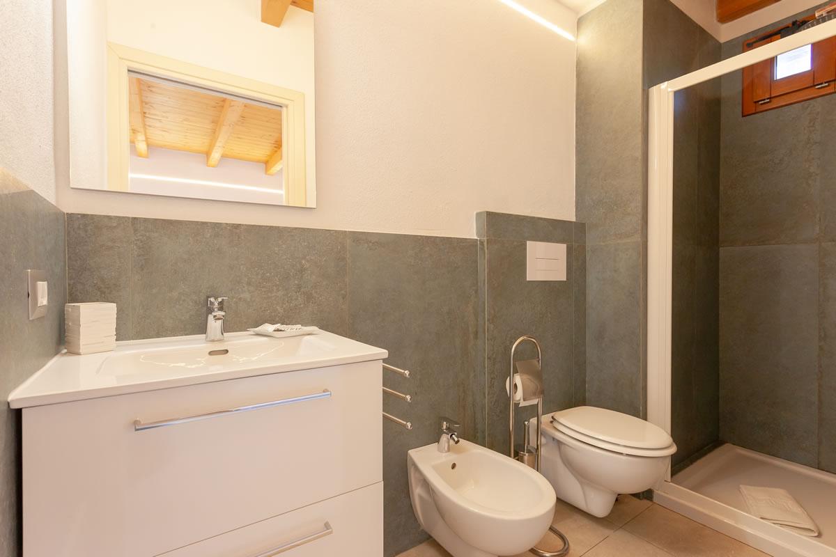 Residenze Pettirosso Pettirosso Center San Teodoro -  Camera Camera Deluxe 1