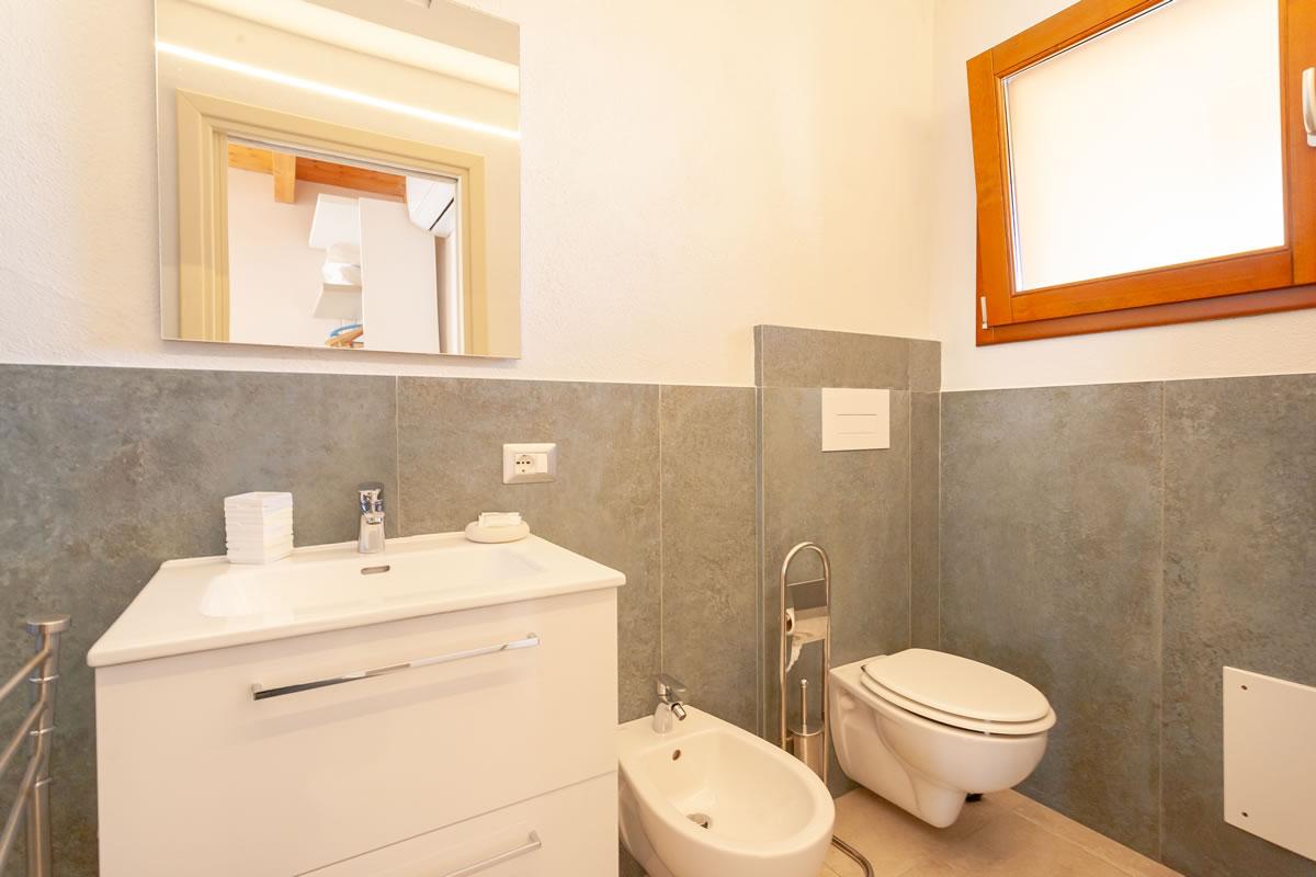 Residenze Pettirosso Pettirosso Center San Teodoro -  Camera Camera Deluxe 1